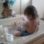 playing in the sink