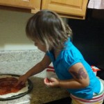 Trying to make pepperoni pizza but she is eating all of the pepperonis